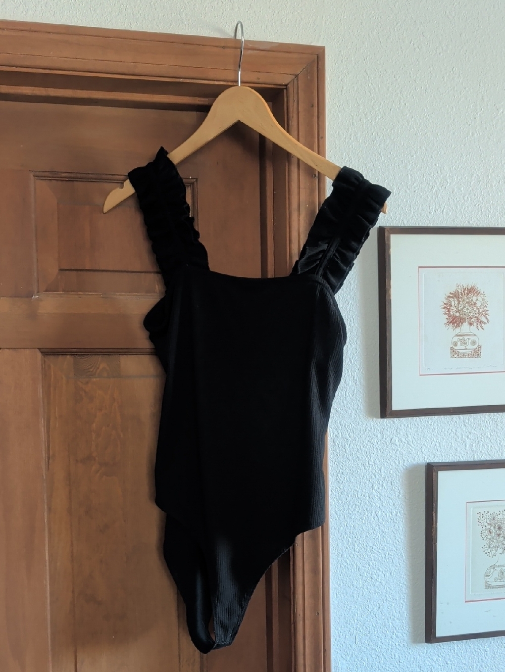 entro Black Ribbed One-Piece Bodysuit with Ruffle Strap
